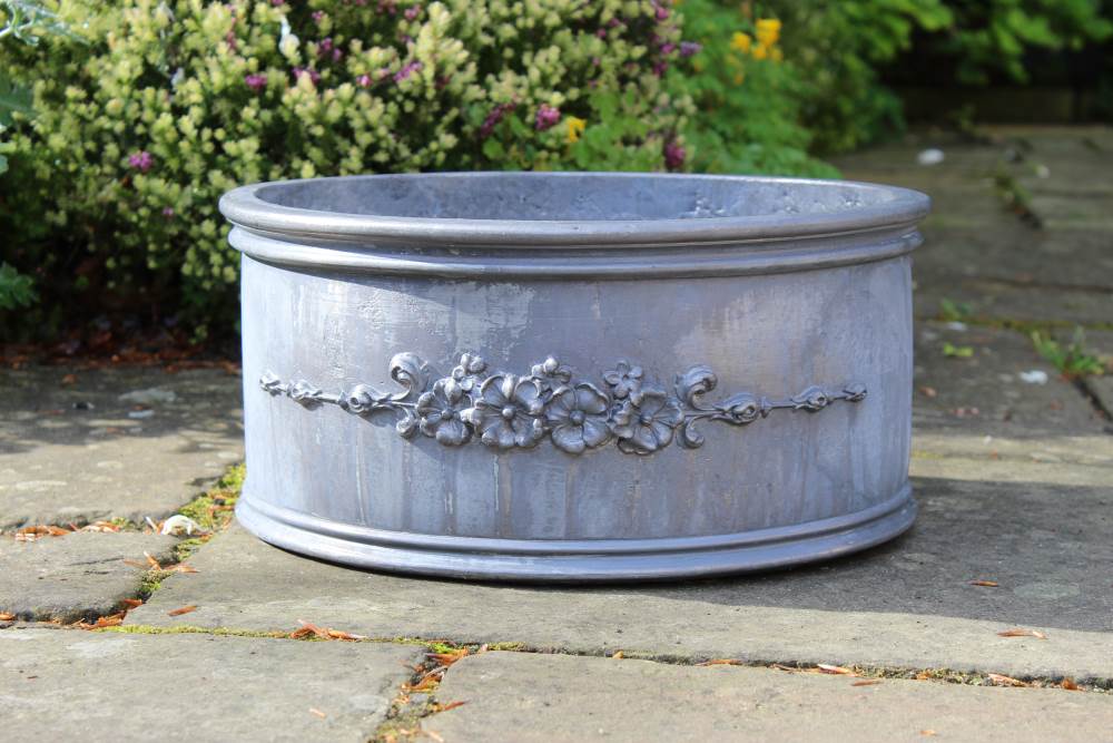 FLORAL SPRAY ROUND LEAD PLANTER