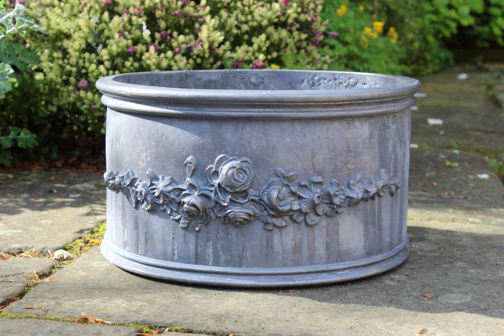 ROSES & RANUNCULUS ROUND LEAD PLANTER