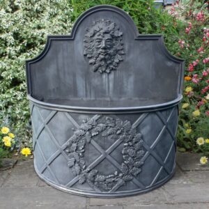 OAK GARLAND DEMI-LUNE LEAD WATER FEATURE