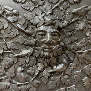 Our magnificent Large Hawthorn Green Man Lead Planter is hand poured in solid foundry-cast lead. The face of the Green Man is surrounded by hawthorn leaves and four finches can be seen amidst the branches eating the berries. The Green Man has an ancient and complex history and can be found right across the globe. Generally thought to be symbolic of natural vitality and regeneration, our Green Man sits in hawthorn, again symbolic of fertility and Mayday celebrations.